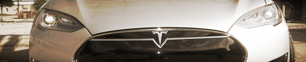 Tesla parked at Green Sun Rising
